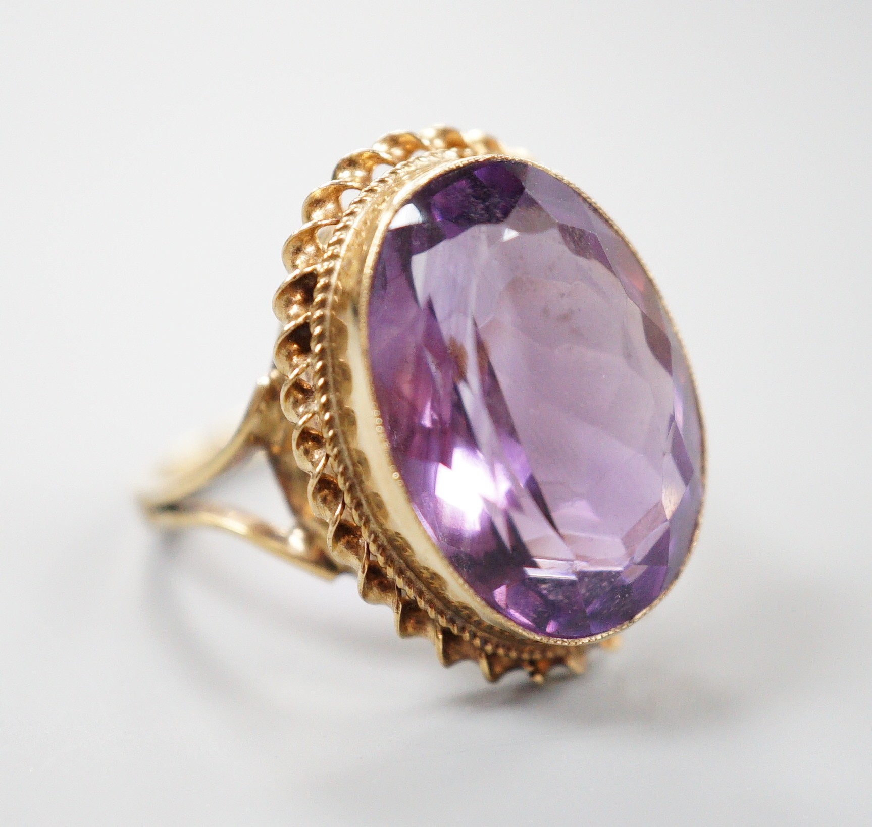 A 1970's 9ct gold and amethyst set dress ring, size O/P gross weight 6.1 grams.